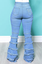 Trendy Ripped Fringed Solid Color Flared Jeans